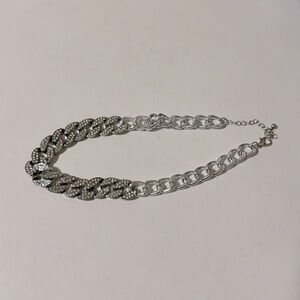 Silver necklace.